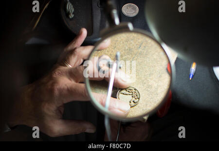 Buenos Aires, Argentina. 3rd Dec, 2015. Argentinian artisan Luis Paz works in his stand during the International Handcraft Fair in the exhibition center La Rural in the city of Buenos Aires, capital of Argentina, on Dec. 3, 2015. Artisans of all the country and Latin America present their products in the fair that includes metal, glass, and wood crafts, sculptures, jewelry, clothing, ceramic, decorations, toys and games, furniture, musical instruments, daily life articles, accesories and craft gastronomic products. © Martin Zabala/Xinhua/Alamy Live News Stock Photo