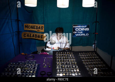 Buenos Aires, Argentina. 3rd Dec, 2015. Argentinian artisan Luis Paz works in his stand during the International Handcraft Fair in the exhibition center La Rural in the city of Buenos Aires, capital of Argentina, on Dec. 3, 2015. Artisans of all the country and Latin America present their products in the fair that includes metal, glass, and wood crafts, sculptures, jewelry, clothing, ceramic, decorations, toys and games, furniture, musical instruments, daily life articles, accesories and craft gastronomic products. © Martin Zabala/Xinhua/Alamy Live News Stock Photo