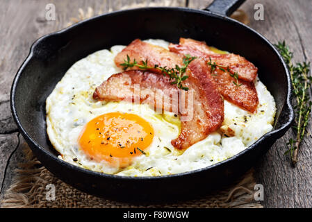 Fried eggs and bacon, close up view Stock Photo
