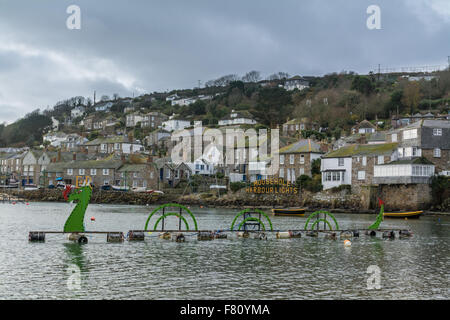 Mousehole, Cornwall, UK. 4th December 2015. The displays are starting to appear around the village of Mousehole in preparation for the lights switch on, on Saturday 12th December. Many thousands of visitors from across the UK and world are expected to come and see the lights. Credit:  Simon Yates/Alamy Live News Stock Photo
