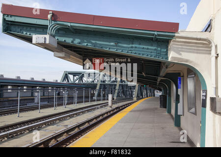 Empty platform at the Smith/9th St. F train elevated subway station in Brooklyn, NY. Stock Photo