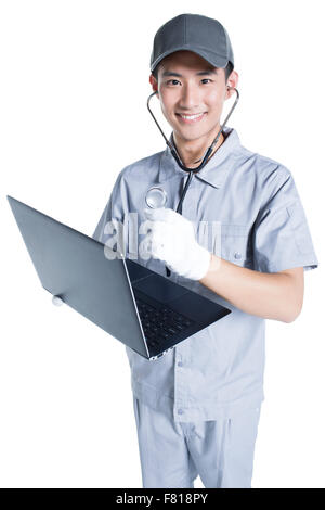 Engineer checking laptop Stock Photo