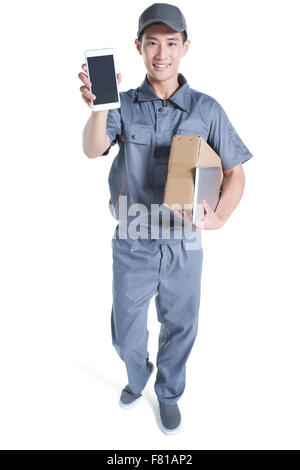 Delivery person showing smart phone Stock Photo