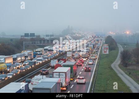 Traffic jam on the A8 in fog, near Stuttgart, Baden-Württemberg, Germany Stock Photo