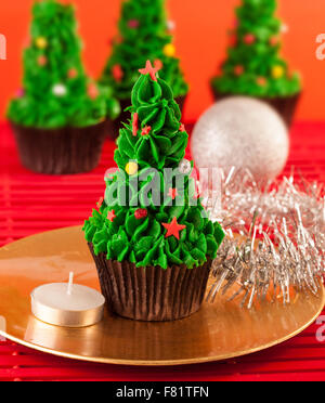 Several christmas tree cupcakes on a table Stock Photo