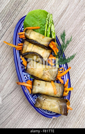 Fresh Eggplant rolls with carrot served dill Stock Photo - Alamy