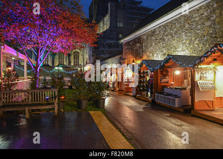Christmas market in the grounds of Winchester Cathedral Hampshire United Kingdom