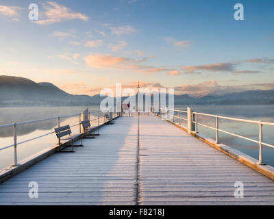 Ullswater jetty at Pooley Bridge on a frosty winter morning. Stock Photo