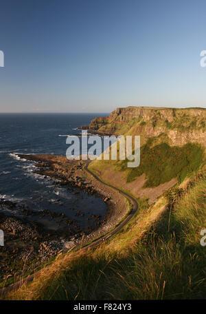 Headland and coastal footpath Giant's Causeway, Antrim, Northern Ireland Stock Photo
