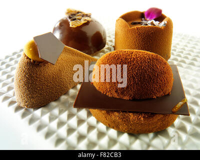a selection of rich hand made patisserie speciality rich indulgent chocolate cakes.