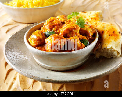 Chicken prepared Madras Indian curry recipe with Pilau rice, Stock Photo