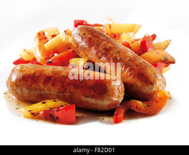 Traditional cooked pork sausage with roast peppers Stock Photo