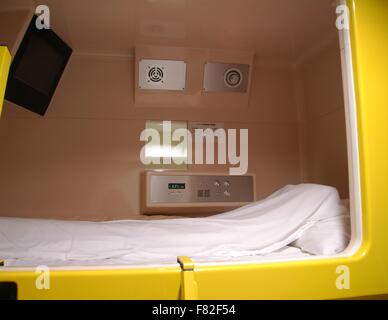 A capsule bed at a hostel in Osaka, Japan. Stock Photo