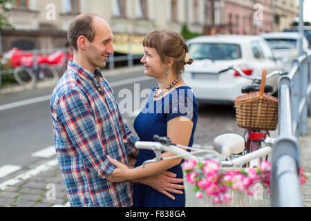 Couple in love standing on the street. Stock Photo