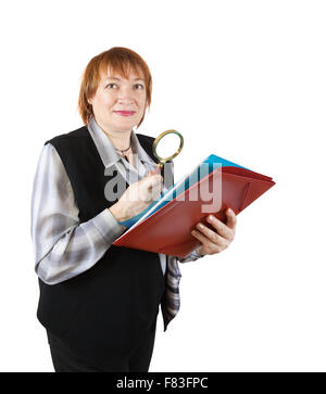 senior woman reading documents through magnifier. Isolated over white Stock Photo