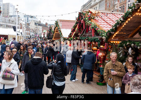 The Old Market Square, Nottingham, UK. 5th December 2015. Christmas shopping at the Christmas Market in Nottingham's Old Market Square on the first Saturday in December which is also the third annual Small Business Saturday, an initiative aimed at encouraging shoppers to support local independent traders. Credit:  Mark Richardson/Alamy Live News Stock Photo