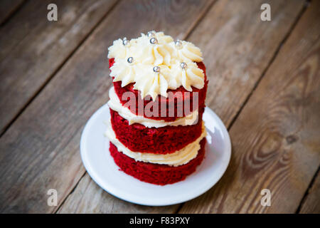 red velvet cake on wooden background Stock Photo