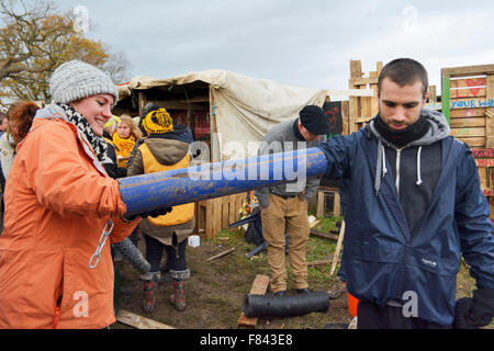 Upton, Cheshire, UK. 5th Dec, 2015. Upton Protection Camp residents lock themselves down at the Duttons Lane site. This group is protesting the exploration drilling of fracking company IGas. Dame Vivienne Westwood turned up to show her support. Credit:  Dave Ellison/Alamy Live News Stock Photo