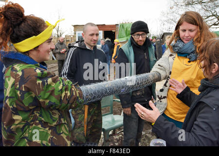 Upton, Cheshire, UK. 5th Dec, 2015. Upton Protection Camp residents lock themselves down at the Duttons Lane site. This group is protesting the exploration drilling of fracking company IGas. Dame Vivienne Westwood turned up to show her support. Credit:  Dave Ellison/Alamy Live News Stock Photo