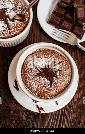 French traditional chocolate souffle in white plate Stock Photo