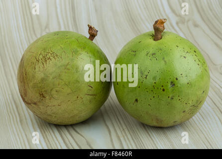 Asian fruit Sapote - on wood background Stock Photo