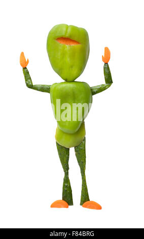 Ninja made of green pepper throws hands up Stock Photo