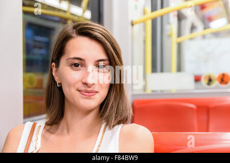 Young Girl Traveling By Subway Public Transport Stock Photo