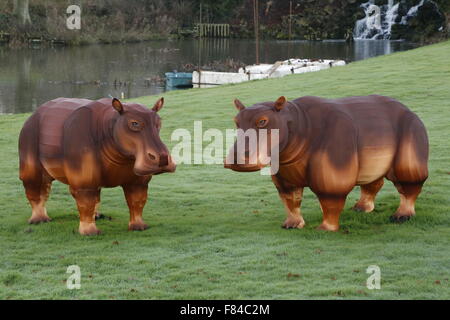 A pair of Longleat Festival of Light wire framed silk hippopotamus animals in the gardens of the main house
