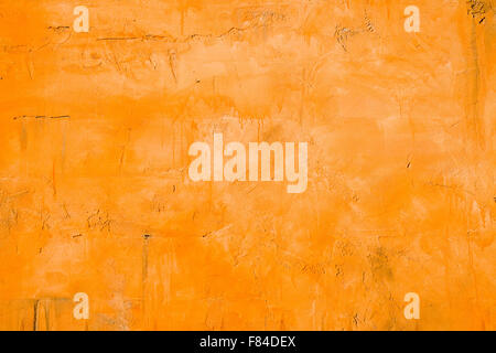 An orange plastered mediterranean wall Stock Photo