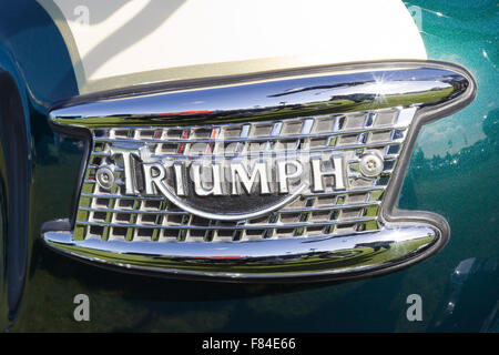 Chrome Badge on a classic Triumph Motorcycle Stock Photo