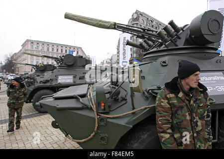 Kiev, Ukraine. 05th Dec, 2015. Ukrainian servicemen on the opening of the military exhibition 'Weapons of victory' during the Day of the Armed Forces of Ukraine at St. Michael's Square. The exhibition presents Ukrainian armored personnel carriers BTR-3 and BTR-4, and the new armored car Dozor-B, which will soon be sent to the East of Ukraine. © Vasyl Shevchenko/Pacific/Alamy Live News Stock Photo