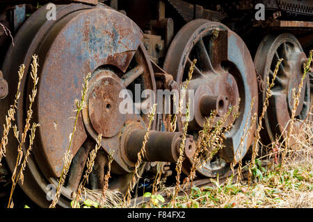 Close up wheels on abandoned steam powered locomotive. Virginia Museum Of Transportation Stock Photo