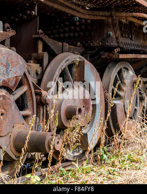 Close up wheels on abandoned steam powered locomotive. Virginia Museum Of Transportation Stock Photo