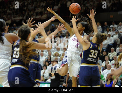 Stores, Connecticut, USA. 5th Dec, 2015. Players from Uconn and Notre Dame battle for a loose ball during a game at Gampel Pavilion in Stores, Connecticut. Gregory Vasil/Cal Sport Media/Alamy Live News Stock Photo