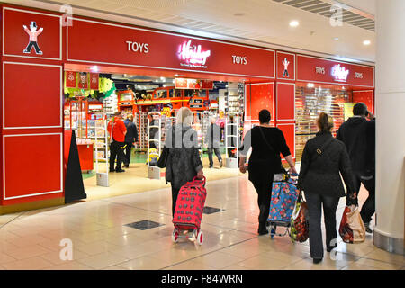 Hamleys toy store shop front & shoppers in the Intu Lakeside indoor shopping mall at West Thurrock in Essex England UK Stock Photo