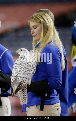 San Diego, California, USA. 5th Dec, 2015. A USAFA student holds the school falcon during the Mountain West Conference Championship NCAA football game between the San Diego State University Aztecs and the United States Air Force Academy Falcons at Qualcomm Stadium in San Diego, California. SDSU Aztecs defeat the United States Air Force Falcons 27 - 24. Justin Cooper/CSM/Alamy Live News Stock Photo