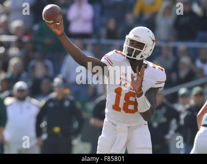 Waco, Texas, USA. 05th Dec, 2015. Texas quarterback Tyrone Swoopes (18) prepares for a pass during the second half of an NCAA college football game between the Texas Longhorns and Baylor Bears at McLane Stadium in Waco, Texas. Texas won 23-17. Austin McAfee/CSM/Alamy Live News Stock Photo