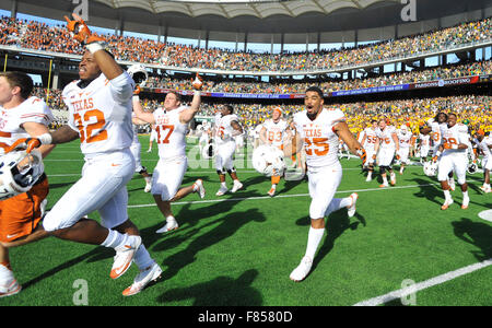 Waco, Texas, USA. 05th Dec, 2015. Texas players run onto the field celebrating after an NCAA college football game between the Texas Longhorns and Baylor Bears at McLane Stadium in Waco, Texas. Texas won 23-17. Austin McAfee/CSM/Alamy Live News Stock Photo