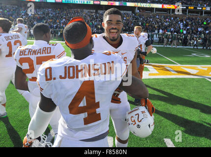 Waco, Texas, USA. 05th Dec, 2015. Texas cornerback Antwuan Davis (25) celebrates with receiver Daje Johnson (4) following an NCAA college football game between the Texas Longhorns and Baylor Bears at McLane Stadium in Waco, Texas. Texas won 23-17. Austin McAfee/CSM/Alamy Live News Stock Photo