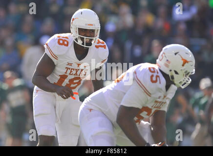 Waco, Texas, USA. 05th Dec, 2015. Texas quarterback Tyrone Swoopes (18) makes adjustments to his teammates during the second half of an NCAA college football game between the Texas Longhorns and Baylor Bears at McLane Stadium in Waco, Texas. Texas won 23-17. Austin McAfee/CSM/Alamy Live News Stock Photo