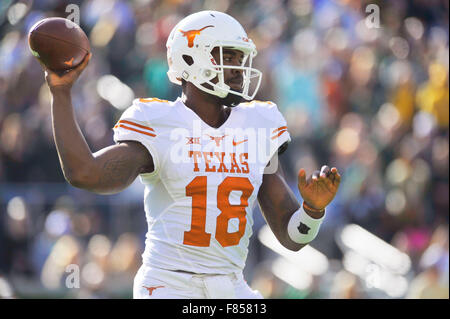 Waco, Texas, USA. 05th Dec, 2015. Texas quarterback Tyrone Swoopes (18) prepares for a pass during the second half of an NCAA college football game between the Texas Longhorns and Baylor Bears at McLane Stadium in Waco, Texas. Texas won 23-17. Austin McAfee/CSM/Alamy Live News Stock Photo