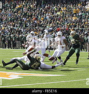 Waco, Texas, US. 5th Dec, 2015. QB #(13) Chris Johnson of Baylor is hit by the longhorns defense and knocks the ball loose for a fumble. © Hoss Mcbain/ZUMA Wire/Alamy Live News Stock Photo