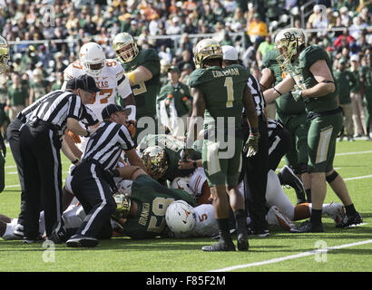 Waco, Texas, US. 5th Dec, 2015. QB #(13) Chris Johnson of Baylor is hit by the longhorns defense and the ball is knocked loose for a fumble. The longhorns recover the fumble. © Hoss Mcbain/ZUMA Wire/Alamy Live News Stock Photo