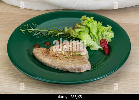 Grilled tuna steak with rosemary and cedar nut Stock Photo