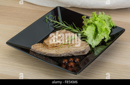 Grilled tuna steak with rosemary and cedar nut Stock Photo