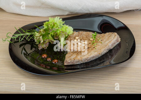 Grilled tuna steak with rosemary and cedar nut Stock Photo