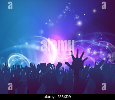 Crowd background of peoples hands up in celebration in silhouette with abstract lights background Stock Photo