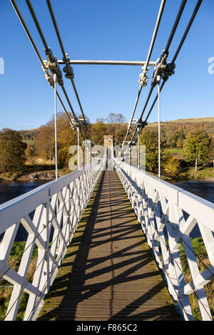 Looking along Chainbridge footbridge, route of Southern Upland Way across River Tweed. Melrose, Scottish Borders, Scotland, UK, Britain Stock Photo