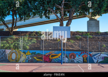 Chicano Park, mural, basketball court,  urban, Barrio Logan. San Diego, California, United States. Stock Photo