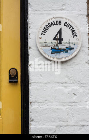 A house number plate. Stock Photo